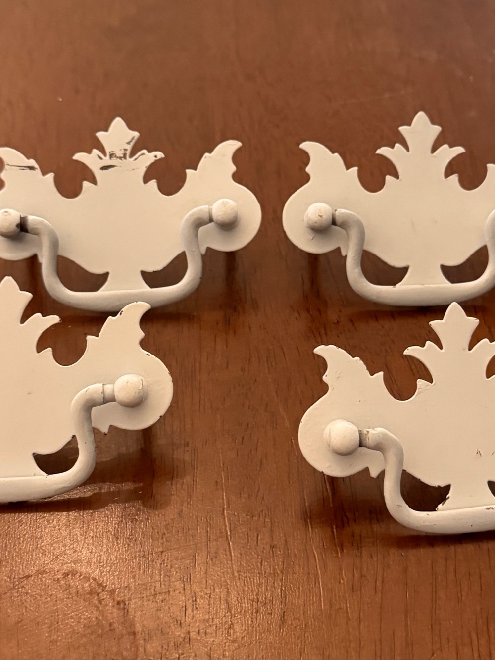 Stamped brass Chippendale-style drawer pulls. Set of 4.